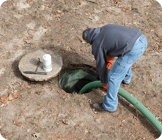 septic repair technician pumping tank